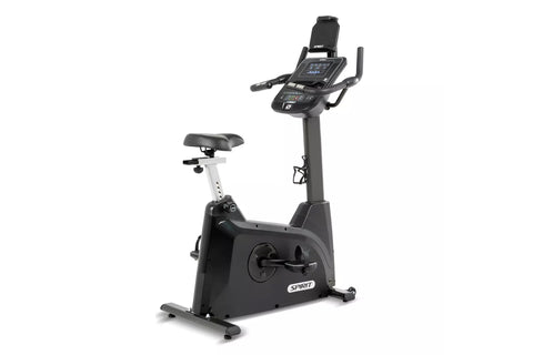 Spirit XBU55 upright exercise bike with black frame, digital console display, padded seat, and handlebars on white background