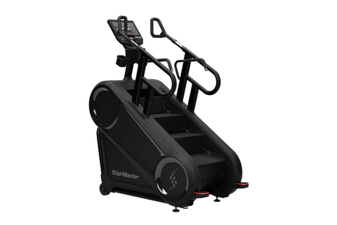 StairMaster Gauntlet 10G black stairclimbing machine with dual handles, digital console, and stepped platform on white backgr