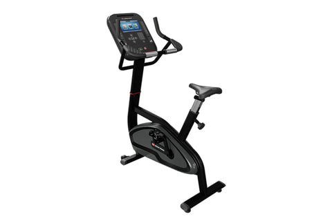 Black upright stationary bike with digital console display, handlebars, and black seat on white background
