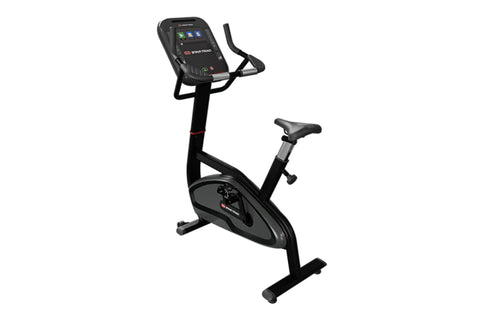 Black upright stationary bike with digital console display, handlebars, and black seat on white background