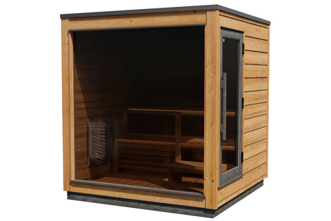 Cedar wood outdoor sauna with black roof and glass door, mounted on wooden deck with ivy-covered wall backdrop