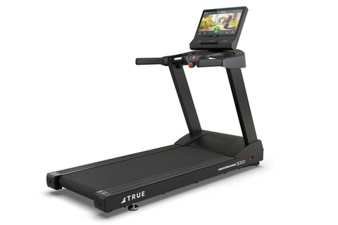 Black TRUE Performance 3000 treadmill with digital touchscreen display, control console, and wide running deck on white backg