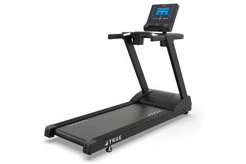 Black TRUE Z500 treadmill with digital blue display console, handrails, and wide running deck on white background