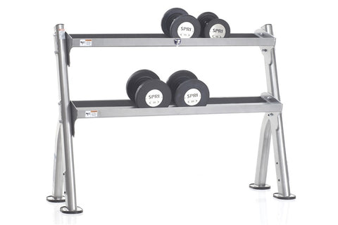 Three-tier gray steel kettlebell storage rack with black handles, holding colorful kettlebells in green, teal, purple, and re