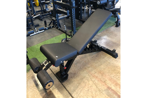 Black and blue adjustable weight bench with padded seat and backrest, sturdy metal frame, displayed in gym setting