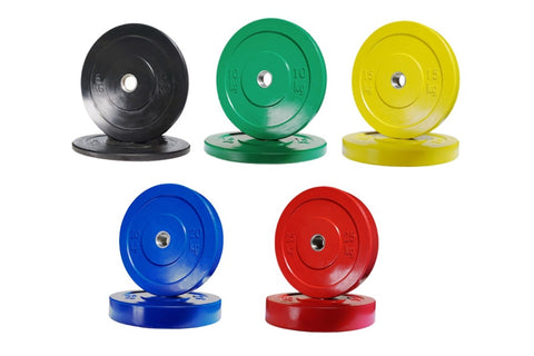 Set of six colored rubber bumper plates in light blue, black, green, yellow, blue, and red with weight markings, arranged in 