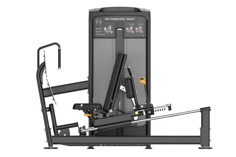 Warrior Elite Commercial Series black leg press and hack squat machine with orange accents, instruction panel, and footplate 