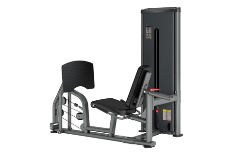 Black and gray commercial leg press machine with padded seat and backrest, adjustable foot platform, and tall vertical frame 
