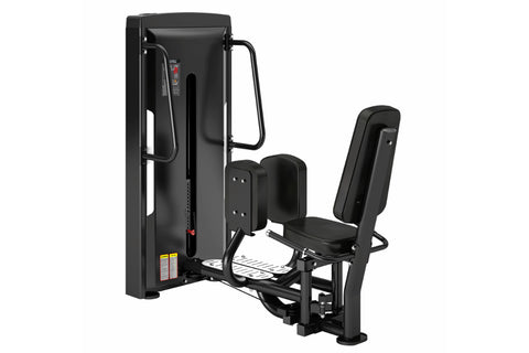 Black commercial leg abduction machine with padded seat and backrest, metal frame, and footplate on white background