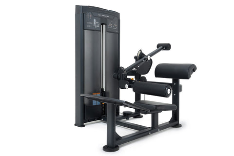 Black commercial hip thruster machine with padded seat, leg extension attachment, and instruction panel on tall frame, on whi