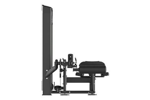 Warrior Elite commercial leg curl machine with black upholstered seat and footrest, metal frame, weight stack, and control pa