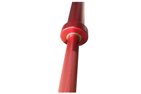 Warrior Lite red aluminum training barbell with textured grip and gold collar detail on white background