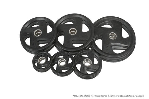 Weightlifting barbell with chrome shaft and black grip collar next to stack of black Olympic weight plates with center holes,