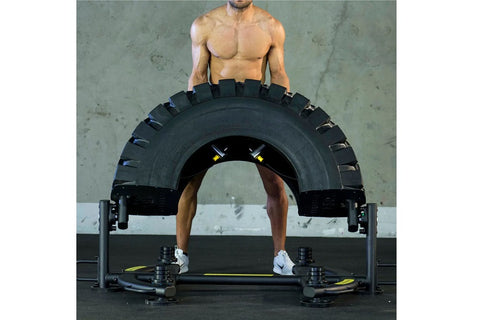 Warrior 180 Tire Flip XL black and yellow tire training equipment with curved frame and adjustment handles on white backgroun