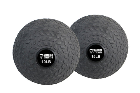 Pair of dark gray textured slam balls labeled 10LB and 15LB with Warrior Strength branding on white background