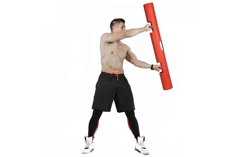 Bright green foam training tube with black reinforced handles and grip bands positioned along its length, on white background