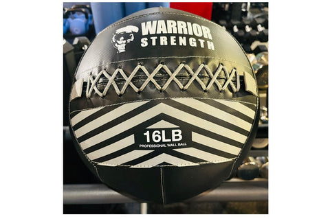 Three black Warrior Strength wall balls with white skull logo and chevron stripe design, labeled 8LB, 10LB, and 12LB