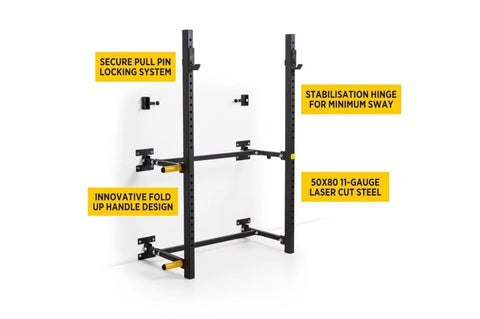Black and yellow wall-mounted squat rack with dual vertical posts, adjustable arms, and safety spotter positions on white bac