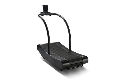 Black curved manual treadmill with curved running belt and dual handles on white background