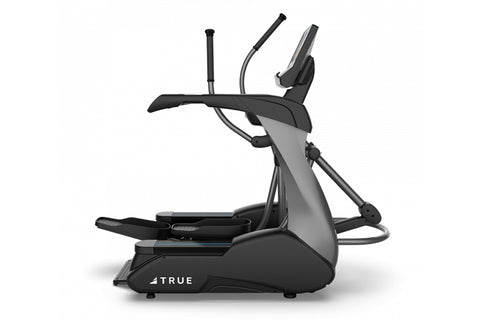 Black and gray commercial elliptical machine with dual handles, foot pedals, and digital display on white background