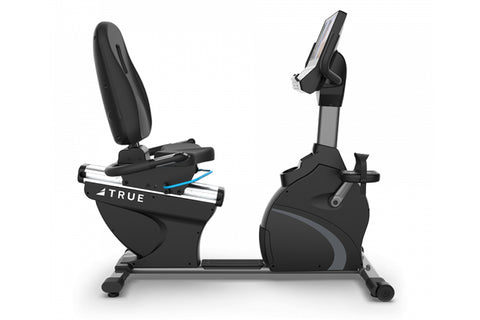 TRUE C900 recumbent exercise bike with black seat, gray accents, and digital console display on white background
