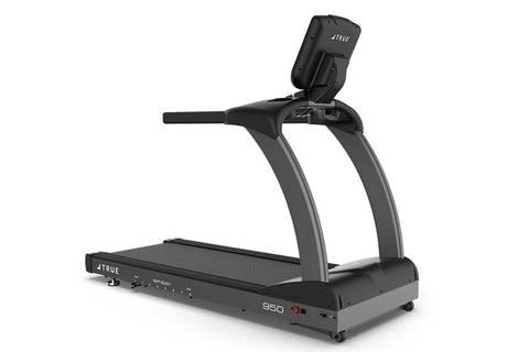 TRUE TR950 treadmill with black and gray frame, digital console, and cushioned running deck on white background