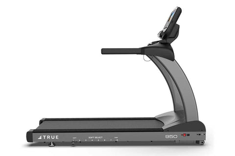 TRUE TR950 treadmill with black and gray frame, digital console, and cushioned running deck on white background
