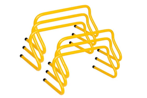 Set of 10 yellow weighted training hurdles with black foot pegs, arranged in rows on white background
