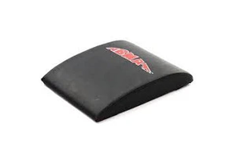 Black curved abdominal mat with red Warrior logo on top, on white background