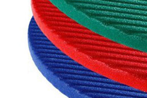 Warrior Ribbed Exercise Mat in blue, red, and teal with textured surface, closeup on white background
