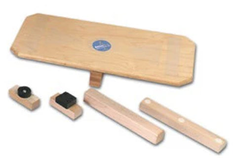 Warrior Combo Board with wooden base, blue logo, and interchangeable black rubber and stone stamping tools, flat lay on white