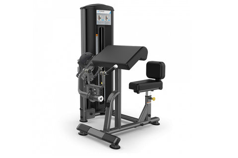 TRUE FS-56 Biceps/Triceps leg extension machine with black cushioned seat and arm pad on white background