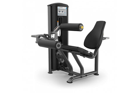 Black TRUE seated leg curl machine with digital display console, padded seat and leg extension bar on white background