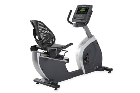 Freemotion r8.9b recumbent exercise bike with black seat, gray frame, digital console display, and footrest on white backgrou