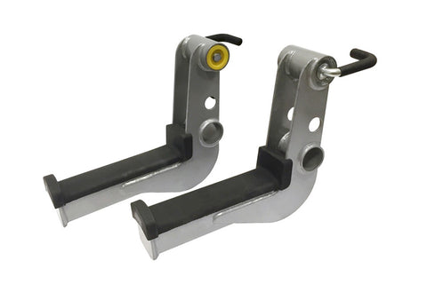 Pair of gray and black metal hoist safety tier attachments with yellow and silver pulleys, black levers, and rubber grips, sh