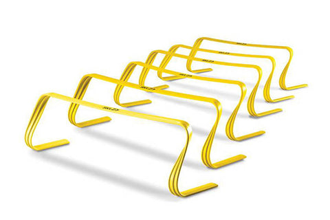 Set of five yellow agility hurdles with adjustable heights, flat lay on white background
