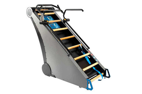 Jacobs Ladder X climbing machine with gray body, black and yellow steps, blue base, and handrails on white background