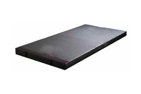 Black vinyl landing mat with thick padded edges on white background