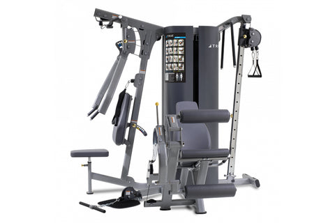 TRUE MP 3.0 multi-station gym equipment with gray frame, black padded seat, dual cable arms, and leg press attachment on whit