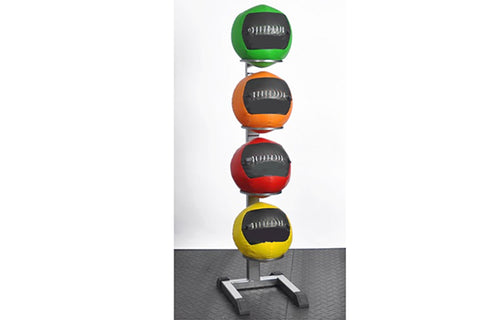 Warrior medicine ball rack holding four stacked medicine balls in green, orange, red, and yellow with black panels, on gray t