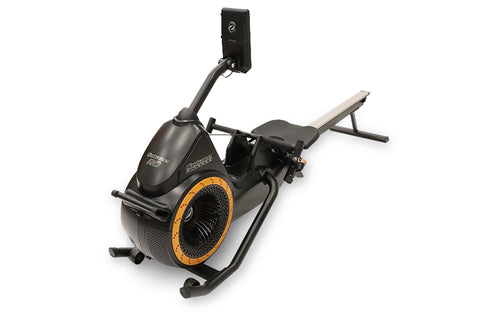 Black recumbent rowing machine with orange accents, digital display console, and adjustable seat on white background