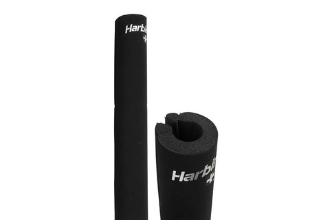 Black foam barbell pad with textured grip surface and white Harbinger branding, shown unrolled and rolled, on white backgroun