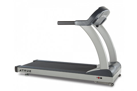 TRUE PS900 treadmill with gray uprights, black running deck, and digital display console on white background