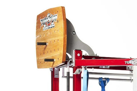 Wooden pegboard rack attachment with white logo on natural plywood, mounted on red metal frame with black hardware