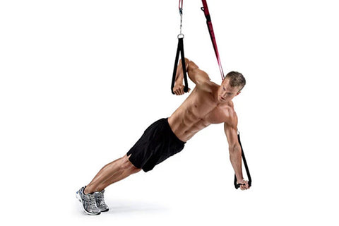 Warrior Rip:60 suspension training straps with man performing angled plank exercise on white background