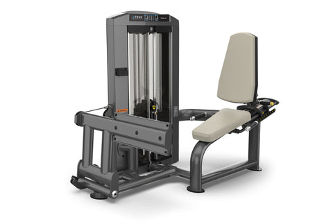 Gray and beige commercial leg press machine with digital display, padded seat, and footplate on white background