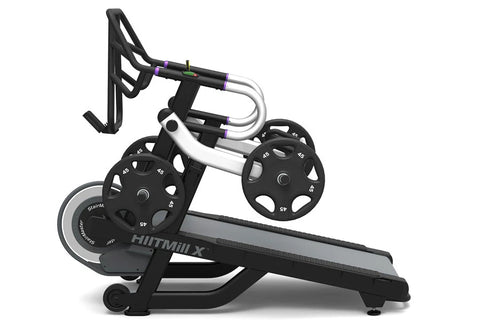 Black and gray StairMaster HIITMill X treadmill with dual handles and digital display on white background