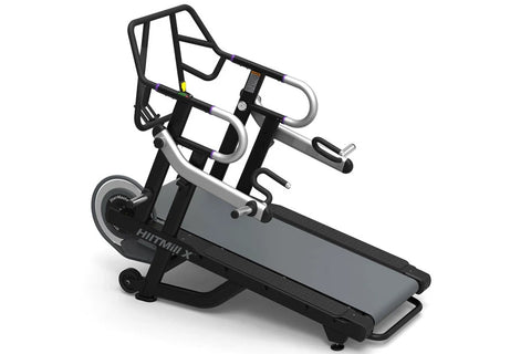 Black and gray StairMaster HIITMill X treadmill with dual handles and digital display on white background