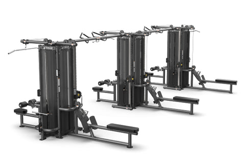 TRUE TMS12000 dual modular strength training frame system with black steel towers, cable crossover attachments, and weight st