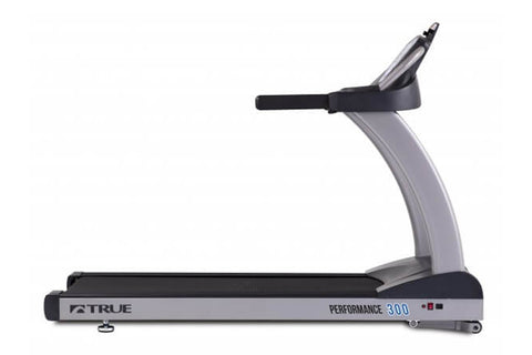 TRUE Performance 300 treadmill with blue digital display console, black running belt, and silver frame on white background